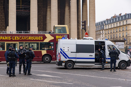 The riot police for the 5th Yellow Vests demonstration (Gilets Jaunes) protesters against fuel tax, government, and French President Macron at Champs-ÃlysÃ©esのeditorial素材