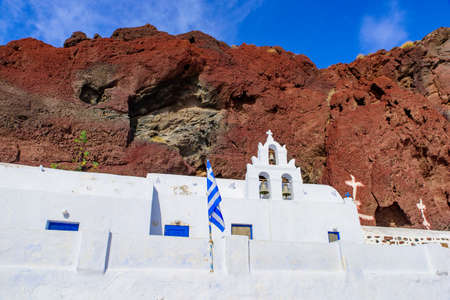 A Greek Orthodox Church near Red Beach in Santorini, Greeceの写真素材