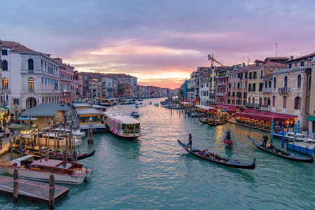 The Grand Canal with gondola and vaporetto at sunset time, Venice, Italyのeditorial素材