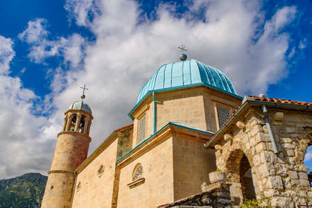 Church of Our Lady of the Rocks on an islet off the coast of Perast in Bay of Kotor, Montenegroの写真素材