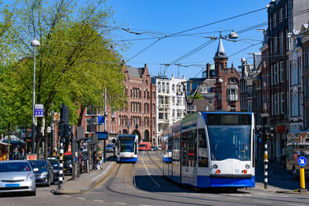 Tram running on the street of Amsterdam, Netherlandsのeditorial素材