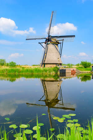 The windmills and the reflection on water in Kinderdijk, a UNESCO World Heritage site in Rotterdam, Netherlandsのeditorial素材