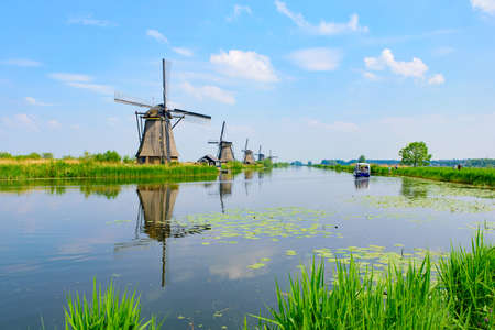 The windmills and the reflection on water in Kinderdijk, a UNESCO World Heritage site in Rotterdam, Netherlandsのeditorial素材