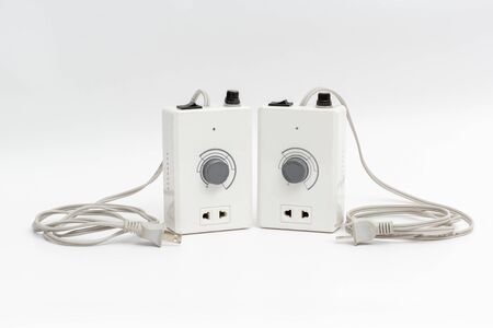 Power plug and Power outlet, isolated on power cord cable unplugged with White background, closeupの写真素材