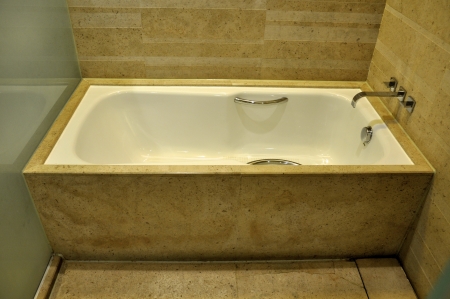 an empty bathroom in a luxury hotel の写真素材