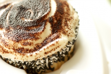 Group of handmade cupcakes and biscuits shot close-up 