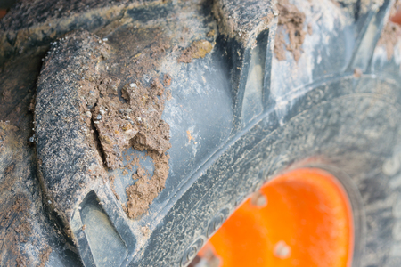 Close up mud on tractor wheelの写真素材