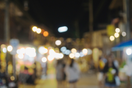 Blur background of night market in chaing khan distinct.This place many people walk and buy souvenir.の写真素材