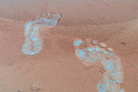 Background of foot stamp in dust.の写真素材