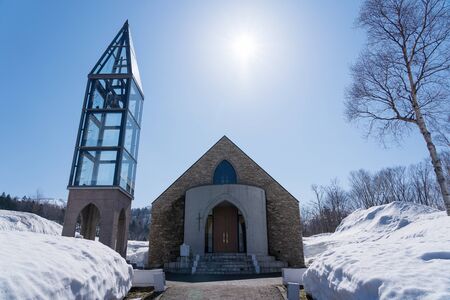 HOKKAIDO - JAPAN - APRIL 2 2018 - The christ church at the Kiroro ski resort with blue sky, Hokkaido, Japan on April 2, 2018.のeditorial素材