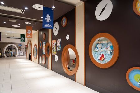 SAPPORO - JAPAN - MARCH 30 2018 - Doraemon Waku Waku wallpaper beside walking path in new Chitose Airport, Hokkaido, Japan.のeditorial素材