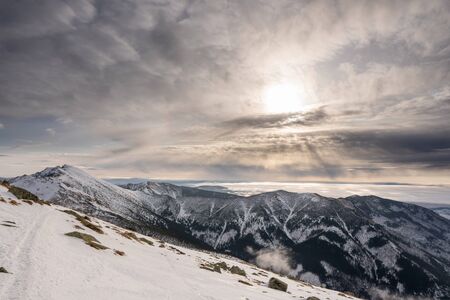 Beautiful clouds in winter landscape in mountains of Slovakia, Slovakia Low Tatrasの写真素材