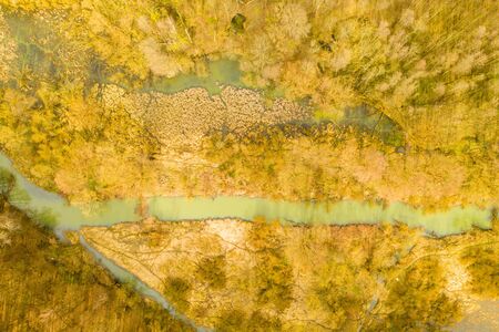 Aerial view of river with swamps at the end of winterの写真素材