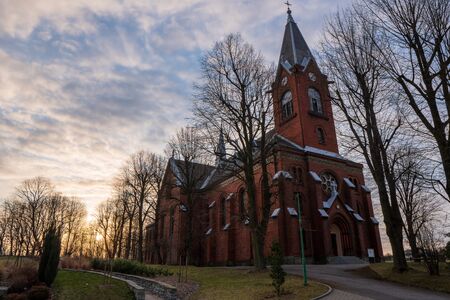 Reds church at sunrise, Czech Stonavaの写真素材