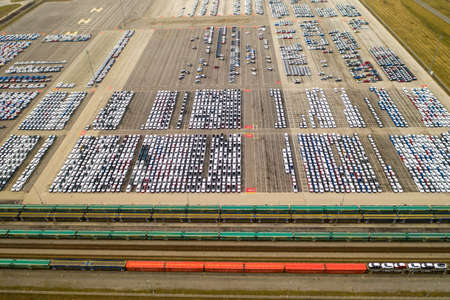 aerial view of big parking lot of new cars from car factory in slovakia , kia 08.03.2020のeditorial素材