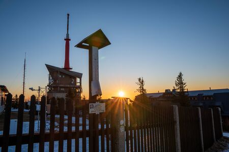 view of transmitter with thermometer on lyse mountain at sunrise, czech beskydy lysa horaの写真素材
