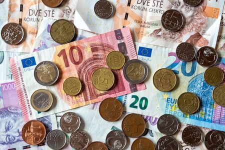 coins and banknotes czech currency and euro, czk czechの写真素材