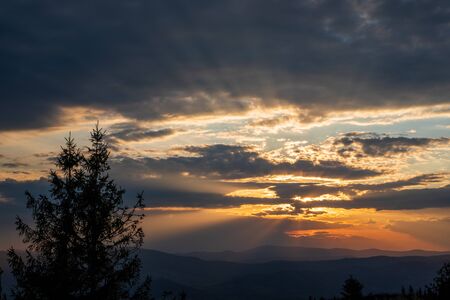 sunrise with beautiful sky and silhouette of landscape, czech beskydyの写真素材
