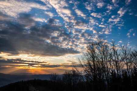 sunrise with beautiful sky and silhouette of landscape, czech beskydyの写真素材