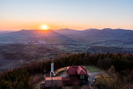 cottage on a large javornik at sunrise, czech beskydy Velky Javornik