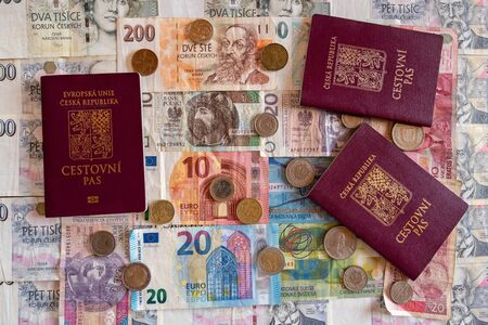 banknotes and coins of different currencies with passport , Euro CHF CZK PLN IDRの写真素材