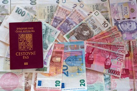 banknotes of different currencies with passport, czech euro IDR CZK PLNの写真素材