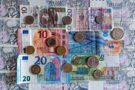 banknotes and coins of various currencies, Euro CHF PLNの写真素材