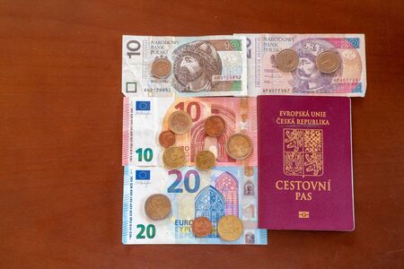 various euro banknotes and coins PLN and passportの写真素材