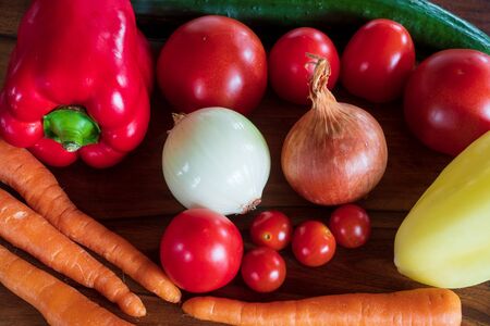 Fresh vegetables on a wooden tableの写真素材