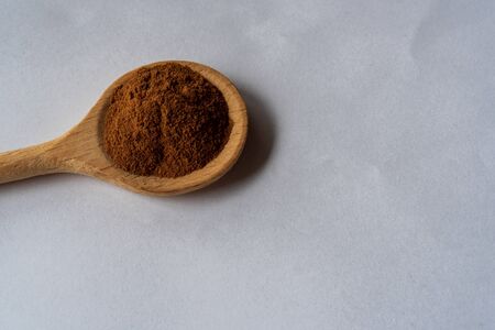 Cinnamon powder isolated on white background. Top viewの写真素材