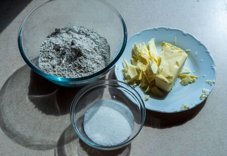 baking ingredients eggs, flour, sugar, butter, yeast. dough preparationの写真素材