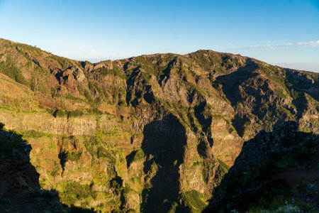 Mountain trail Pico do Arieiro, Madeira Island, Portugal Scenic view of steep and beautiful mountains and clouds during sunrise. October 2021の写真素材