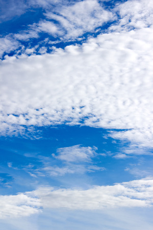 Blue sky and a bit white cloud in summer.の写真素材