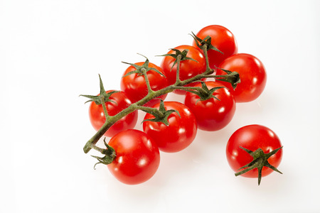 Tomato isolated on white backgroundの写真素材