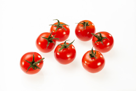 Tomato isolated on white backgroundの写真素材