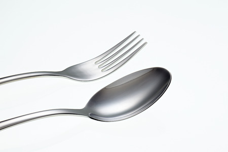 Fork and Spoon isolated on white background.の写真素材