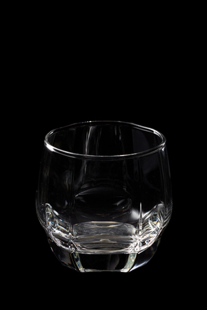 White glass isolated on black backgroundの写真素材