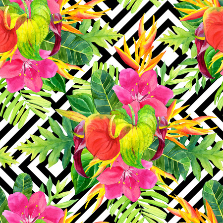 Beautiful pattern with tropical flowers and plants on black and white background with geometric pattern. Composition with palm leaves, anthurium and strelitzia.の写真素材