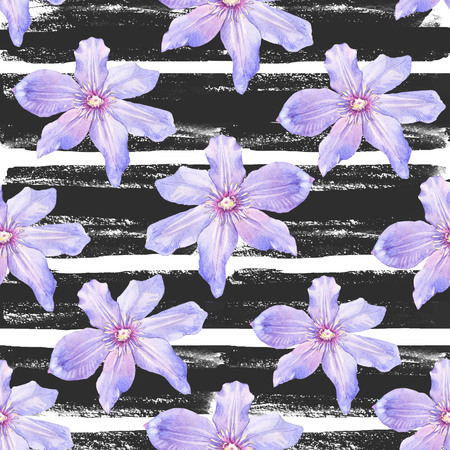 Floral pattern with wild flowers on a striped black and white background for your design and decor.の写真素材