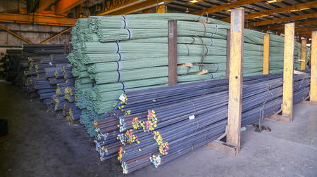 industrial steel iron bars in the factoryの写真素材