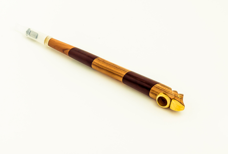 beautiful wooden smoking pipes on white backgroundの写真素材