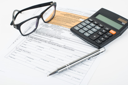 The photo shows the documents to settle the tax in Poland.