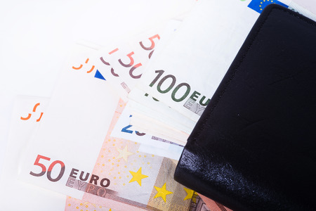The European currency euro in a black wallet.の写真素材