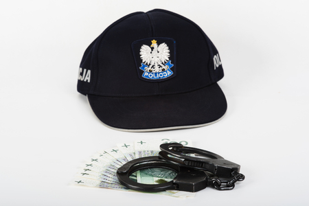 In the picture handcuffs, money and police.の写真素材