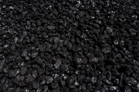 A heap of black coal for sale.