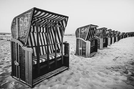 Black and white landscape Polish sea of breakwaters and sand dunes.の写真素材