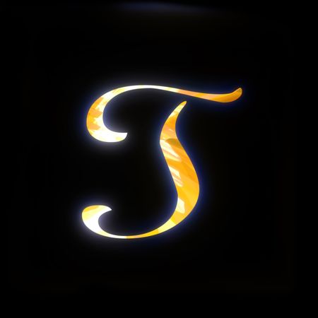 Isolated golden letter T on black backgroundの写真素材