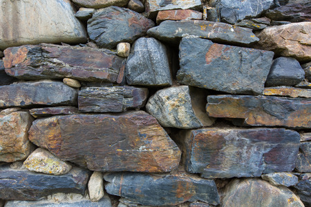 Russia, the Caucasus, North Ossetia. Detail of the stone walls of ancient settlements and battle towers.の写真素材