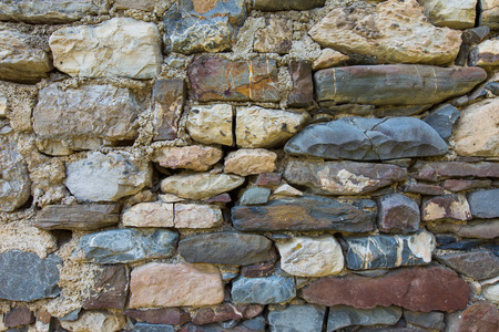 Russia, the Caucasus, North Ossetia. Detail of the stone walls of ancient settlements and battle towers.の写真素材
