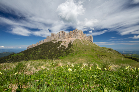 The formation and movement of clouds over the summer slopes of Adygea Bolshoy Thach and the Caucasus Mountainsの写真素材